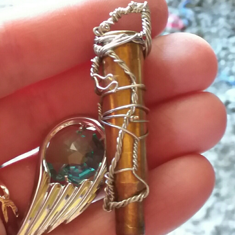 Wing bullet pendant